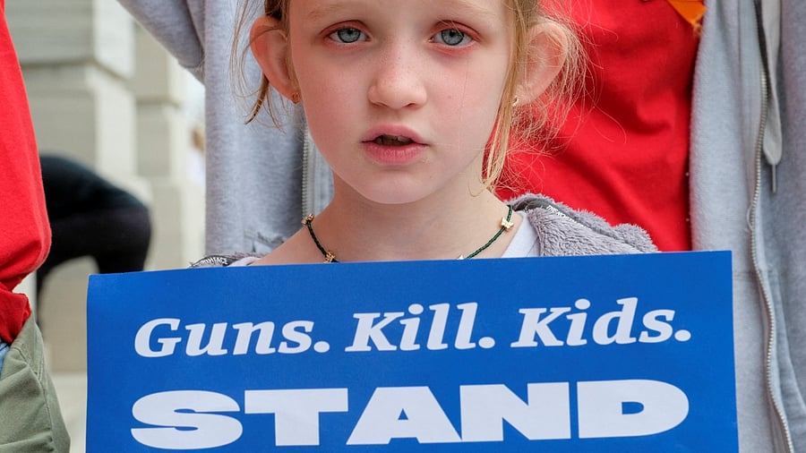 A girl attends a protest at the Tennessee State Capitol to call for an end to gun violence and support stronger gun laws, after a deadly shooting at the Covenant School in Nashville, Tennessee, US, April 3, 2023. Credit: Reuters File Photo
