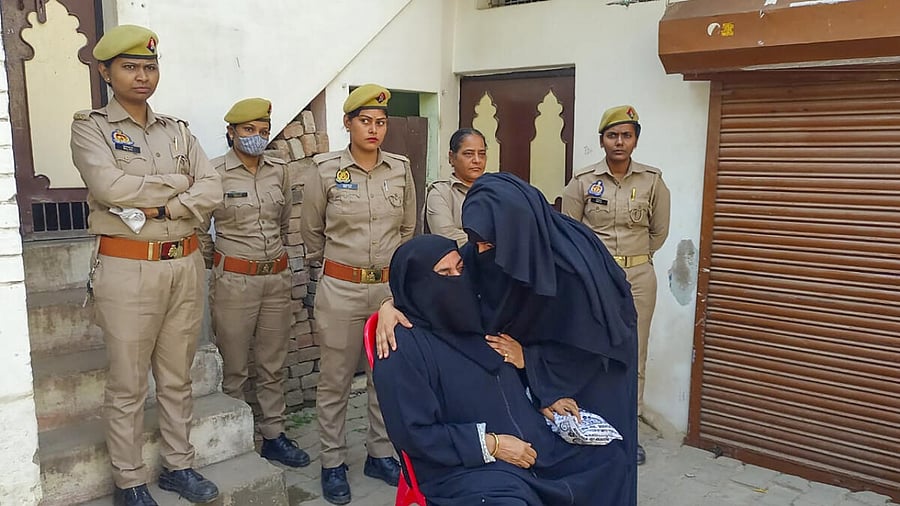 Women relatives mourn during funeral of gangster-turned-politician Atiq Ahmed's son Asad Ahmed, in Prayagraj. Credit: PTI Photo