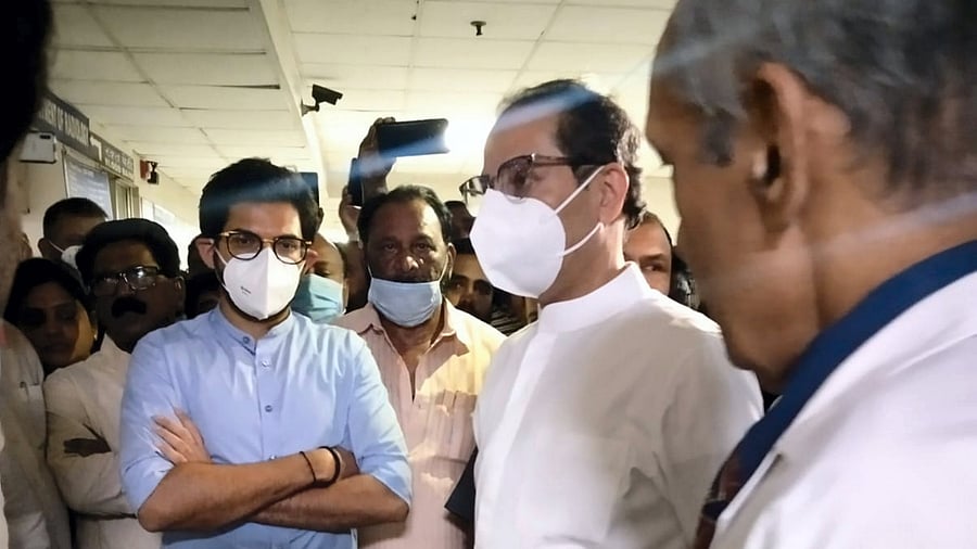 Shiv Sena (Uddhav Balasaheb Thackeray) chief Uddhav Thackeray along with party leader Aaditya Thackeray visits the patients who fell sick due to heat stroke during the Maharashtra Bhushan Samman ceremony, at a hospital in Kamothe. Credit: PTI Photo