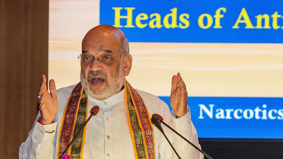  Union Minister for Home Affairs and Cooperation Amit Shah addresses the 1st National Conference of Heads of Anti-Narcotics Task Force (ANTF) of States and UTs. Credit: PTI Photo