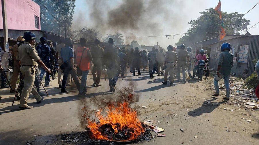 Security personnel try to control the situation after violent protests by locals over the death of a minor girl, in North Dinajpur district of West Bengal. Credit: PTI File Photo