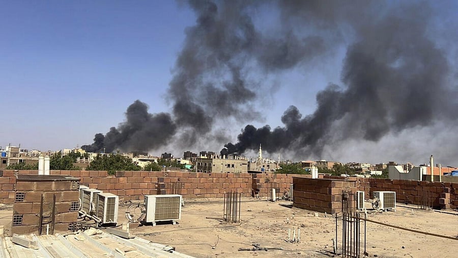 Smoke fills the sky in Khartoum amid the ongoing conflict. Credit: AP/PTI Photo