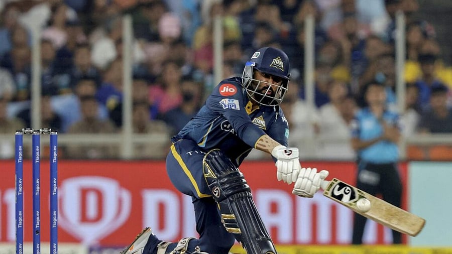Gujarat Titans batter Rahul Tewatiya plays a shot during the IPL 2023 cricket match between Gujarat Titans and Mumbai Indians. Credit: PTI Photo