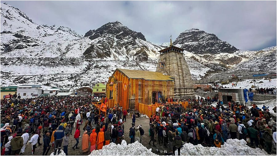 <div class="paragraphs"><p>Devotees  at the Kedarnath Temple.</p></div>