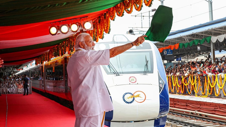 PM Modi flags off a Vande Bharat Express with the cheetah logo from Thiruvananthapuram. Credit: PTI Photo