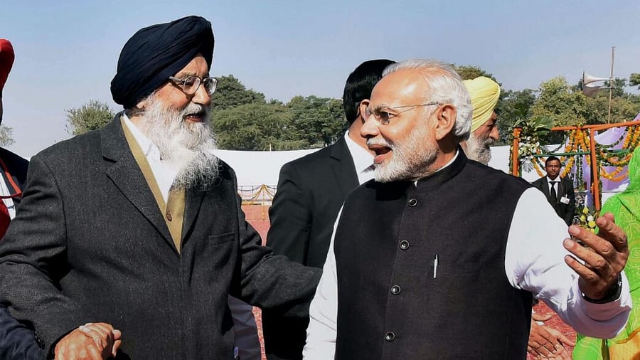 Parkash Singh Badal with Prime Minister Narendra Modi. Credit: PTI File Photo