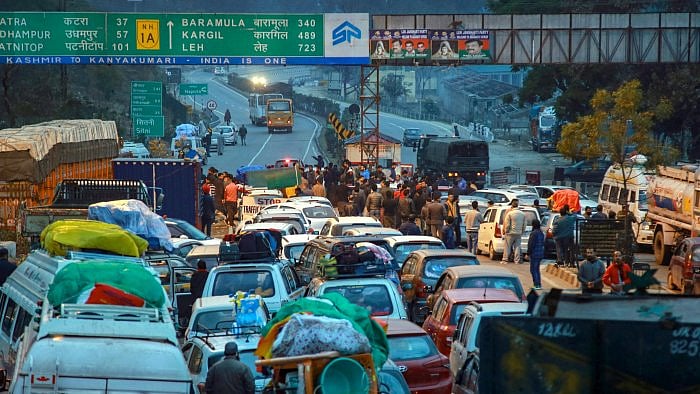 Stranded vehicles on the Jammu-Srinagar national highway near Nagrota, in Jammu. Credit: PTI File Photo