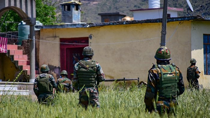 Security personnel during a cordon and search operation at the Bata-Doriya area in Poonch. Credit: PTI Photo