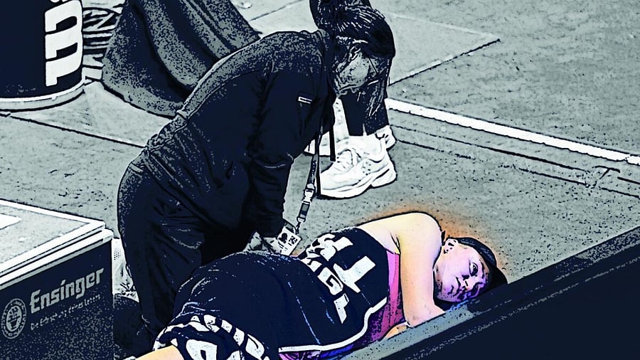 Elena Rybakinaleaves receives medical attention after sustaining an injury during her round of 16 match against Brazil's Beatriz Haddad Maia. Credit: Reuters Photo
