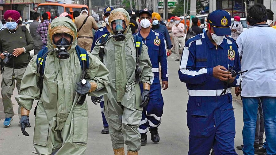 NDRF personnel arrive to inspect the gas leak accident at a factory in Ludhiana. Credit: AFP Photo