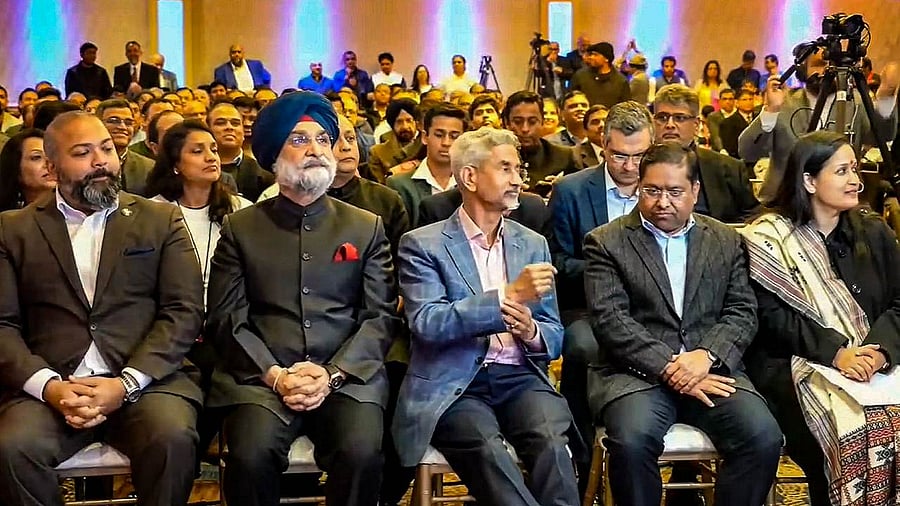 External Affairs Minister S Jaishankar with India’s Ambassador to the US Taranjit Singh Sandhu and other members of Indian community listens to the 100th episode of Prime Minister Narendra Modi's 'Mann Ki Baat' radio programme. Credit: PTI Photo