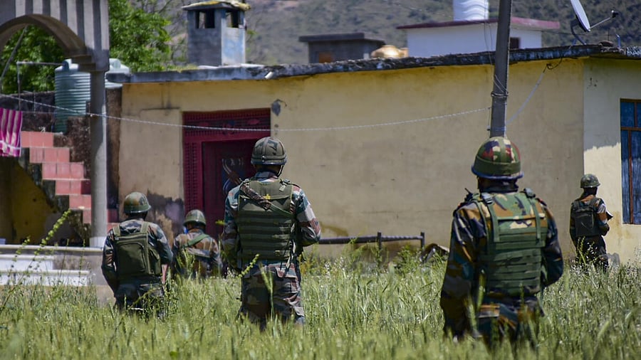 Security personnel during a cordon and search operation at the Bata-Doriya area in Poonch district. Credit: PTI Photo