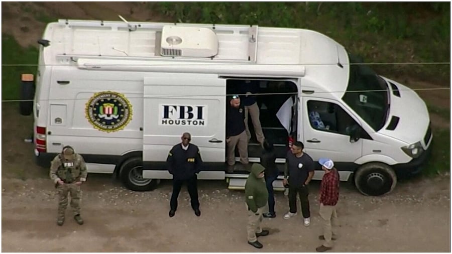 An aerial view shows a Federal Bureau of Investigation (FBI) van where a search is being conducted for Francisco Oropeza, 38, who police say shot dead five neighbors in Cleveland, Texas, U.S. April 29, 2023 in a still image from video. Credit: Reuters Photo