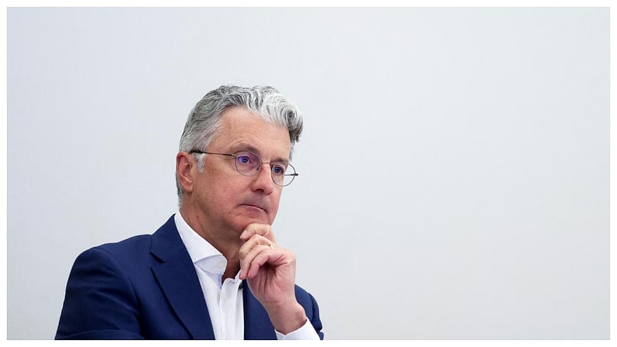 Rupert Stadler, former CEO of German car manufacturer Audi, sits in the courtroom during his trial, at the regional court, in Munich. Credit: AFP Photo