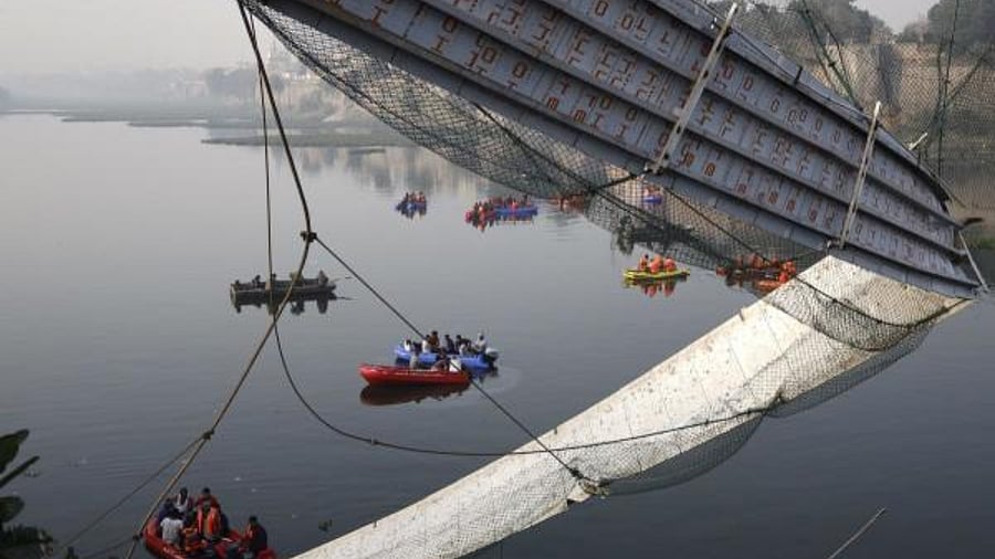 Rescue ops after the Morbi bridge collapsed on October 31, 2022. Credit: PTI Photo