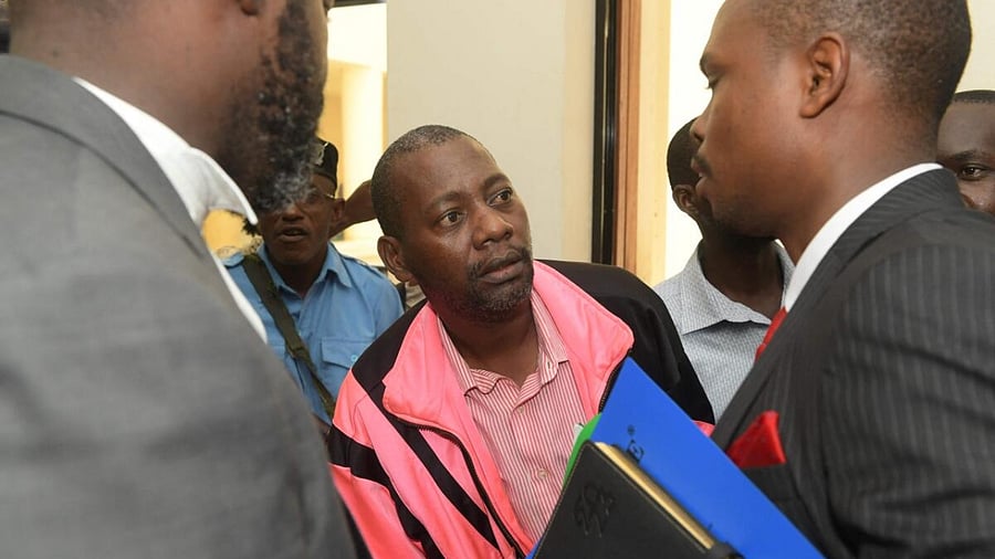 Self-proclaimed pastor Paul Nthenge Mackenzie (C), who is accused of inciting cult followers to starve to death "to meet Jesus". Credit: AFP Photo