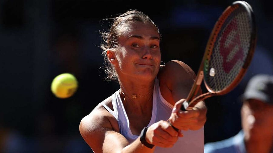 Belarus' Aryna Sabalenka returns the ball to Greece's Maria Sakkari during their 2023 WTA Tour Madrid Open tennis tournament singles semi-final match at Caja Magica in Madrid on May 4, 2023. Credit: AFP Photo