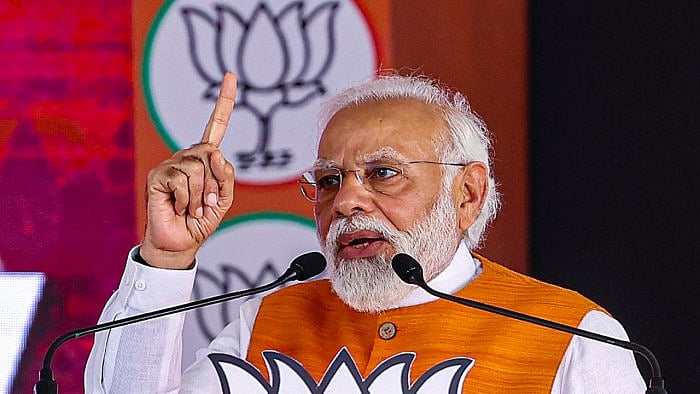 Prime Minister Narendra Modi addresses an election campaign rally ahead of Assembly polls, in Karnataka. Credit: PTI Photo