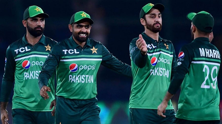Pakistan's captain Babar Azam (2ND-L) and his teammates celebrate after winning the fourth one-day international (ODI) cricket match between Pakistan and New Zealand at the National Stadium in Karachi on May 5, 2023. Credit: AFP Photo