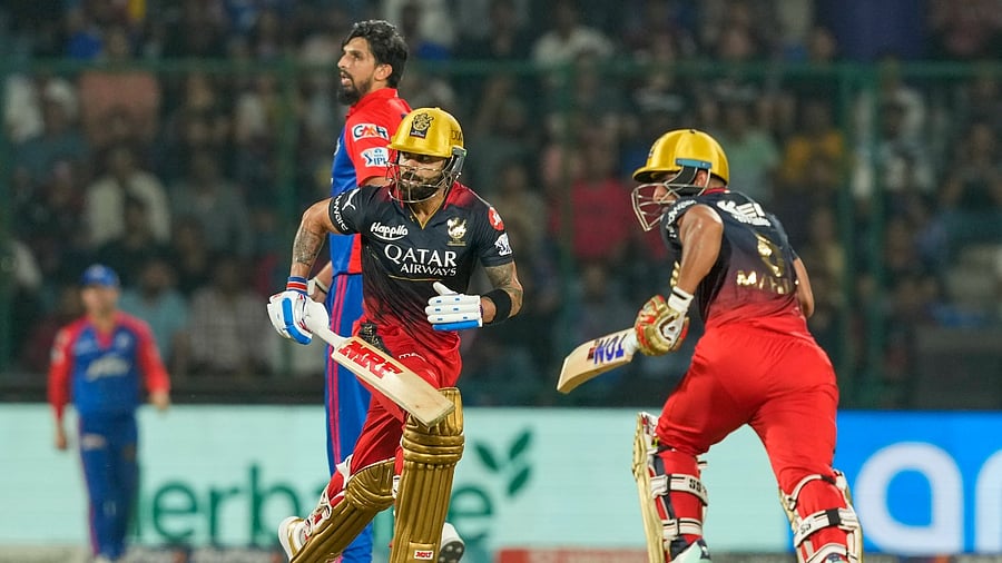 Royal Challengers Bangalore batters Virat Kohli and Mahipal Lomror run between the wickets during the IPL 2023 cricket match. Credit: PTI Photo