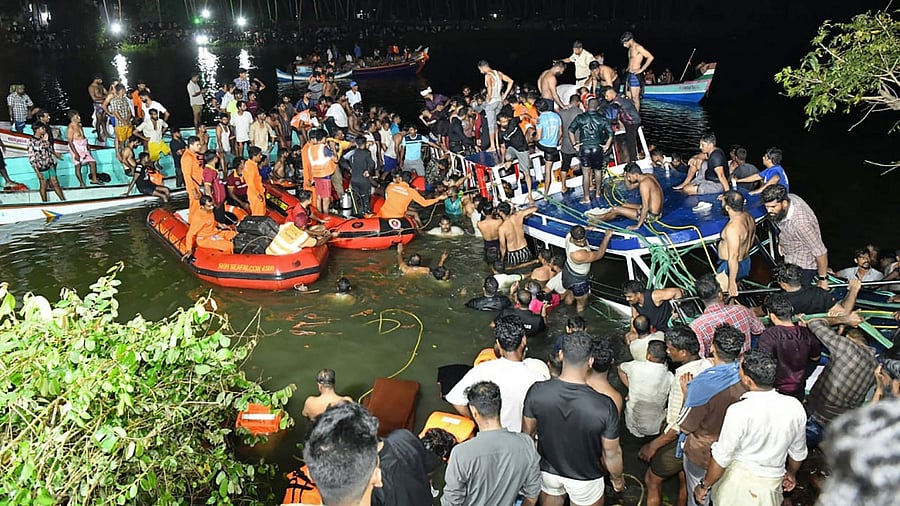 At least 22 people died when a double-decker tourist boat capsized in Kerala. Credit: AFP Photo