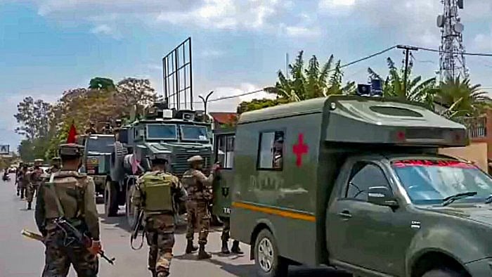 Army and Assam Rifles personnel during a flag march in violence-hit areas in Manipur. Credit: PTI Photo