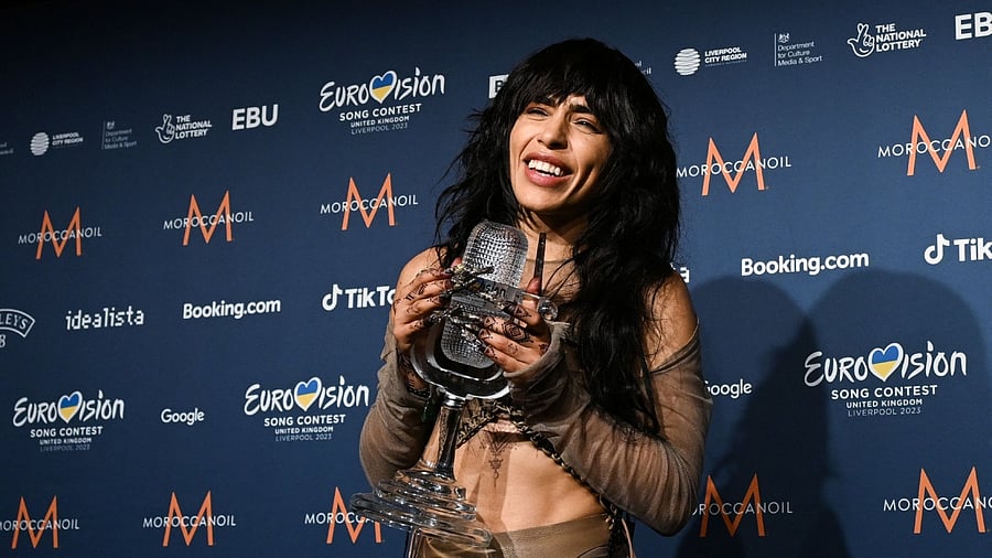 Singer Loreen performing on behalf of Sweden poses with the trophy after winning the final of the Eurovision song contest. Credit: AFP Photo