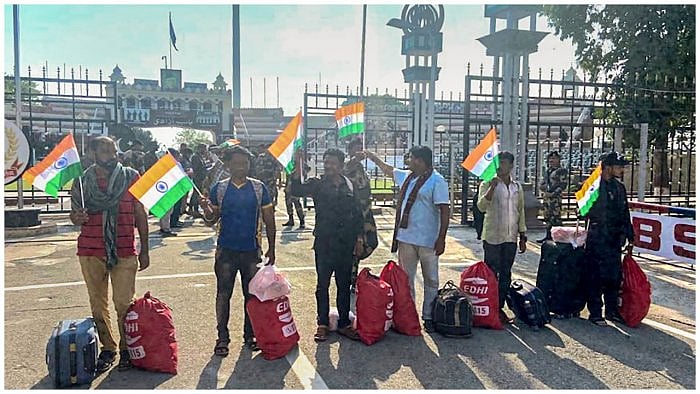 A file photo of released Indian fishermen who were jailed in Karachi for alleged illegal fishing, arriving at Attari-Wagha border in June 2022. Credit: PTI File Photo