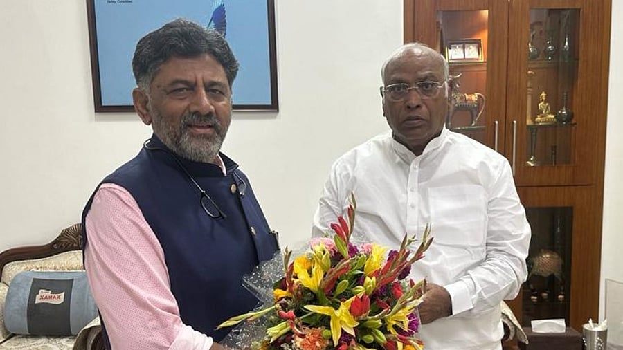 Karnataka Congress President D K Shivakumar with Congress President Mallikarjun Kharge at his residence in New Delhi on Tuesday, May 16, 2023. Credit: PTI Photo