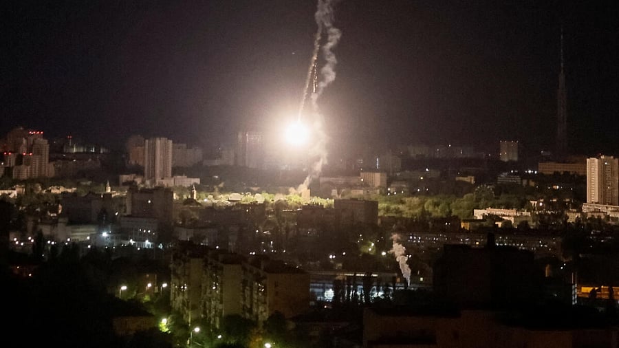 Explosion of a missile is seen in the sky over Kyiv during a Russian missile strike. Credit: Reuters Photo