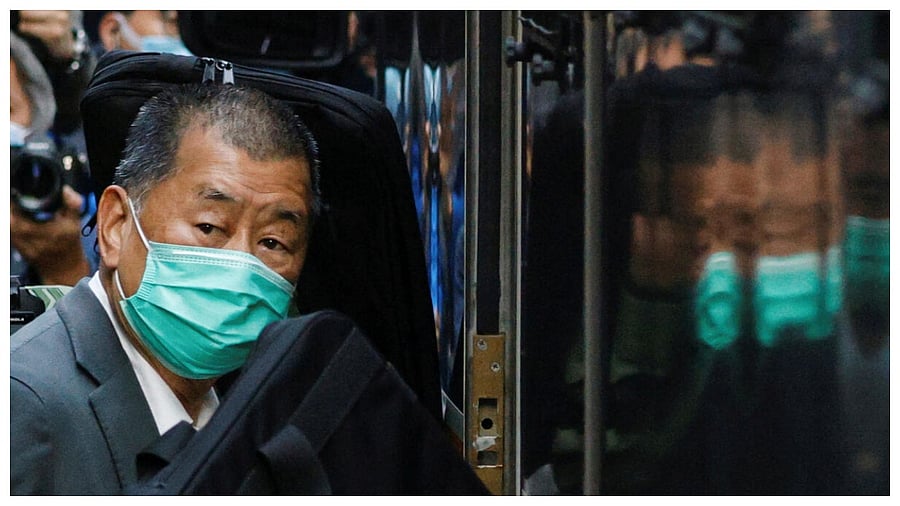 Media tycoon Jimmy Lai, founder of Apple Daily, looks on as he leaves the Court of Final Appeal by prison van, in Hong Kong, China February 1, 2021. Credit: Reuters File Photo