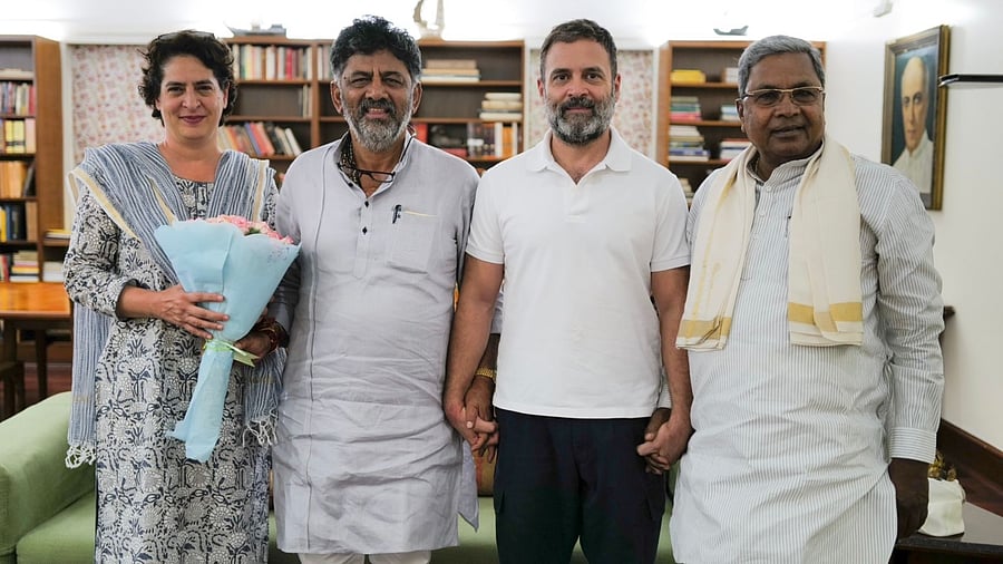 Siddaramaiah, D K Shivakumar meeting Rahul Gandhi and Priyanka Gandhi. Credit: Special Arrangement