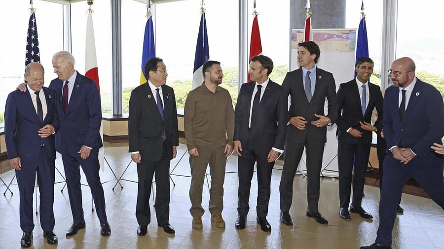 Ukrainian President Volodymyr Zelenskyy, fourth left, and G7 leaders pose for a photo. Credit: AP/PTI Photo