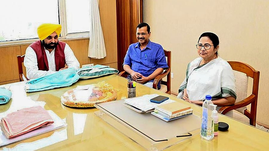 Chief Minister Mamata Banerjee meets with Delhi Chief Minister Arvind Kejriwal and Punjab Chief Minister Bhagwant Mann in Kolkata. Credit: PTI Photo