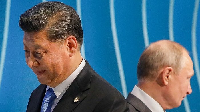 In this file photo taken on November 13, 2019, Russia's President Vladimir Putin (R) and China's President Xi Jinping (L) attend the 11th edition of the BRICS Summit in Brasilia. Credit: AFP Photo