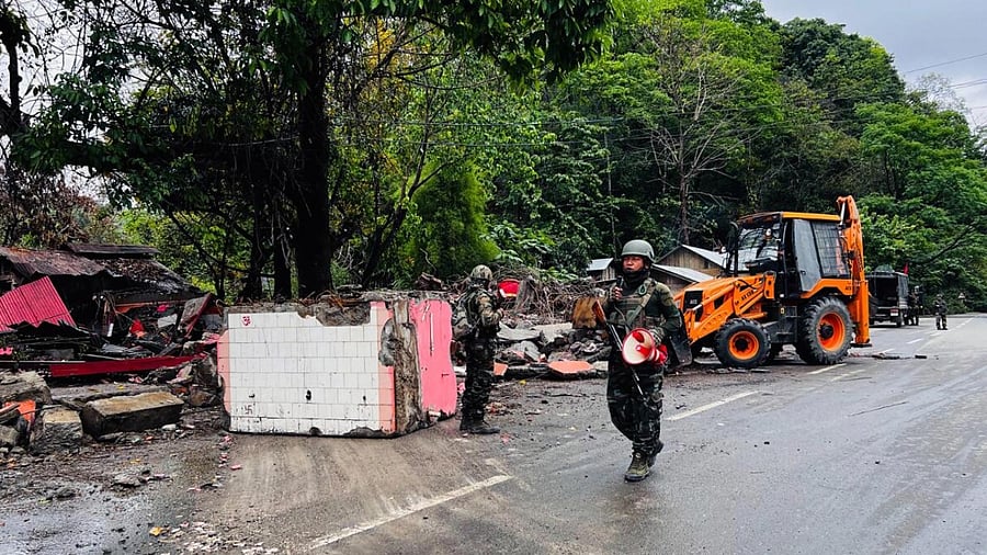 Army personnel guard in the aftermath of recent spurt in violence, in Manipur. Credit: PTI Photo