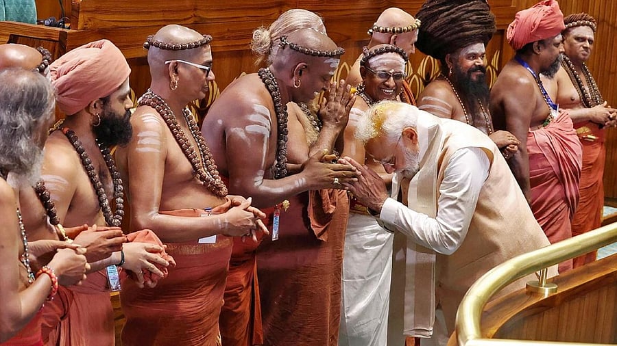 PM Modi takes blessings from priests during the inauguration ceremony of the new parliament building in New Delhi. Credit: AFP Photo