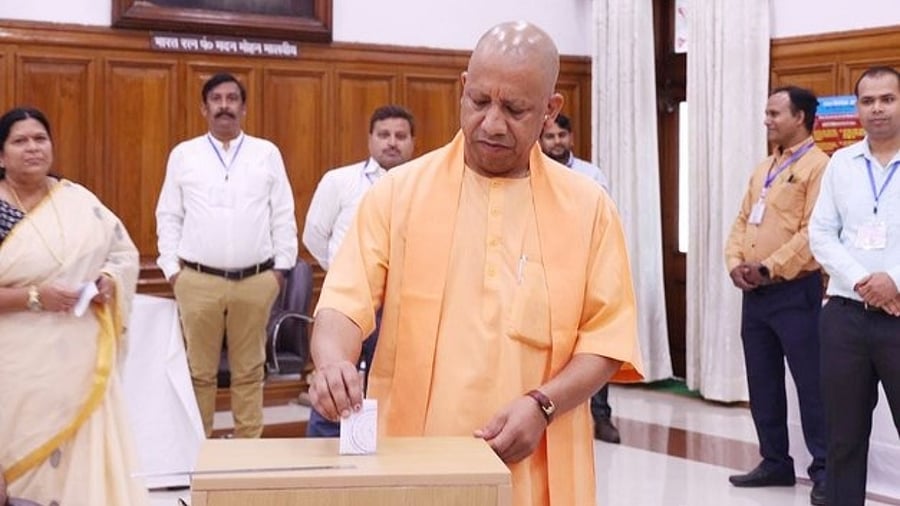 Uttar Pradesh Chief Minister Yogi Adityanath casts his vote for MLC polls, at UP Vidhan Bhawan in Lucknow. Credit: IANS Photo
