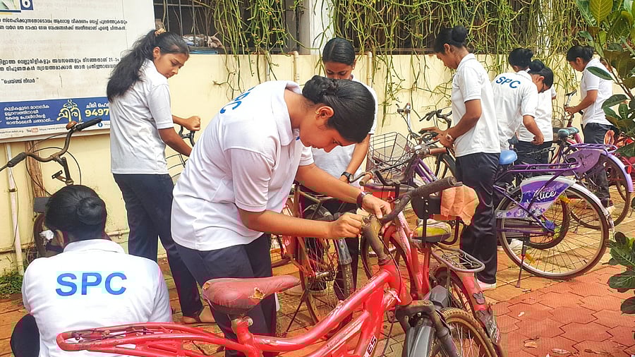 Students recondition used and worn out cycles for distribution among friends from weak background. Credit: Special Arrangement