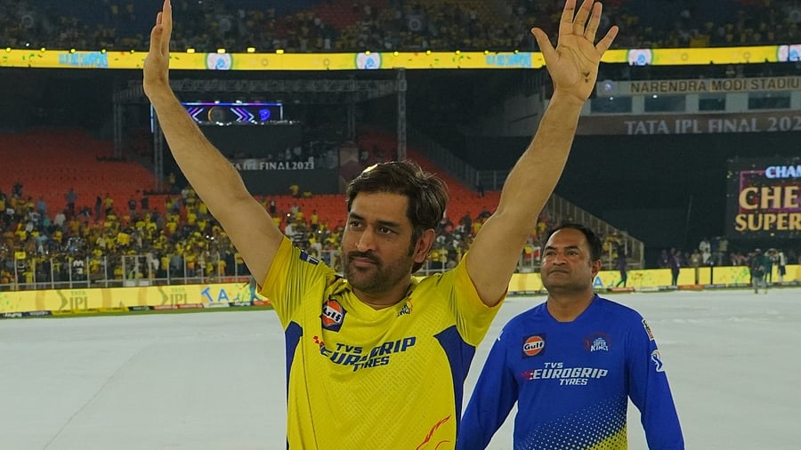 Chennai Super Kings' captain MS Dhoni waves to the crowd after their win in the IPL 2023 final match against Gujarat Titans at the Narendra Modi Stadium in Ahmedabad. Credit: IANS Photo