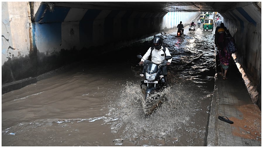 Waterlogged underpass at Lingrajpura following heavy rain in Bengaluru. Credit: DH Photo by B K Janardhan