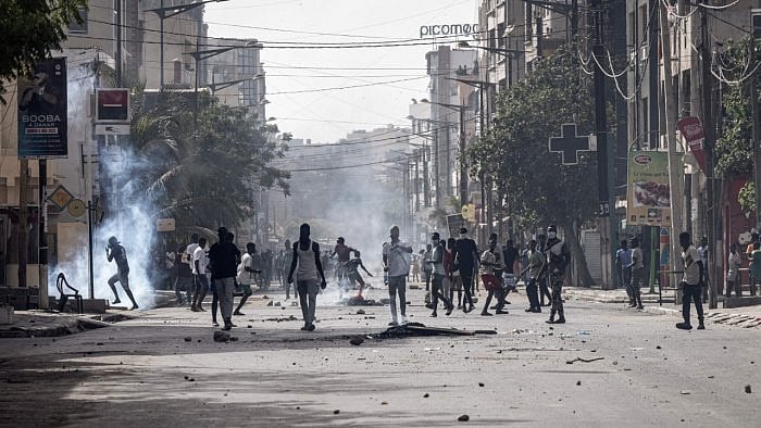 Demonstrators gather during a protest in Dakar. Credit: AFP Photo 