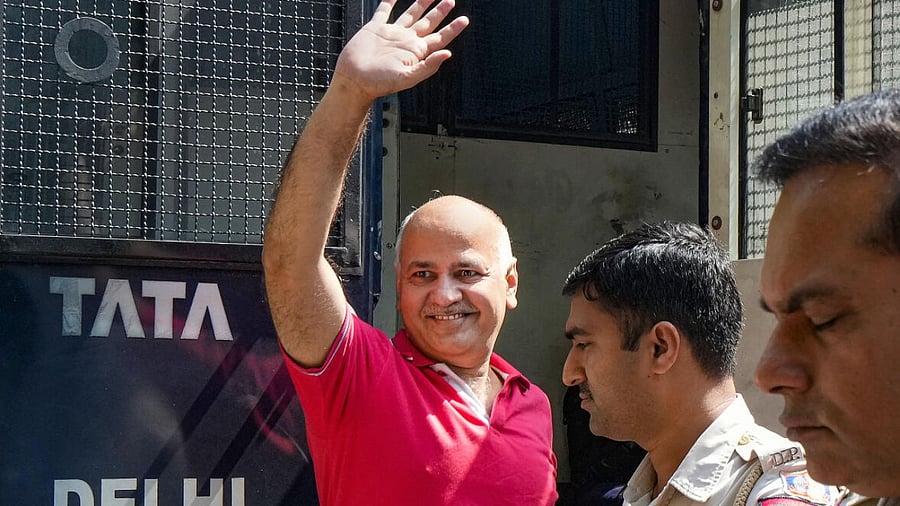 AAP leader Manish Sisodia arrives at his residence in New Delhi, Saturday. Credit: PTI Photo