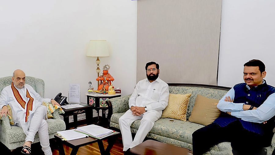 Union Home Minister Amit Shah with Maharashtra Chief Minister Eknath Shinde and Deputy Chief Minister Devendra Fadnavis. Credit: PTI Photo