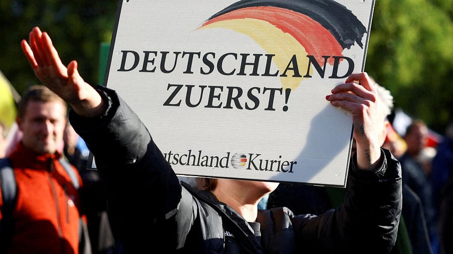 A supporter of Alternative for Germany (AfD) party does a Hitler salute during a protest against the government, amid skyrocketing energy prices, in Berlin, Germany. Credit: Reuters File Photo