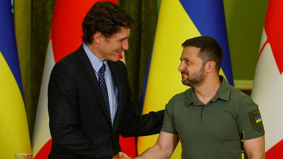 Canadian Prime Minister Justin Trudeau and Ukraine's President Volodymyr Zelenskiy shake hands during a joint press conference, amid Russia's attack on Ukraine, in Kyiv, Ukraine June 10, 2023.