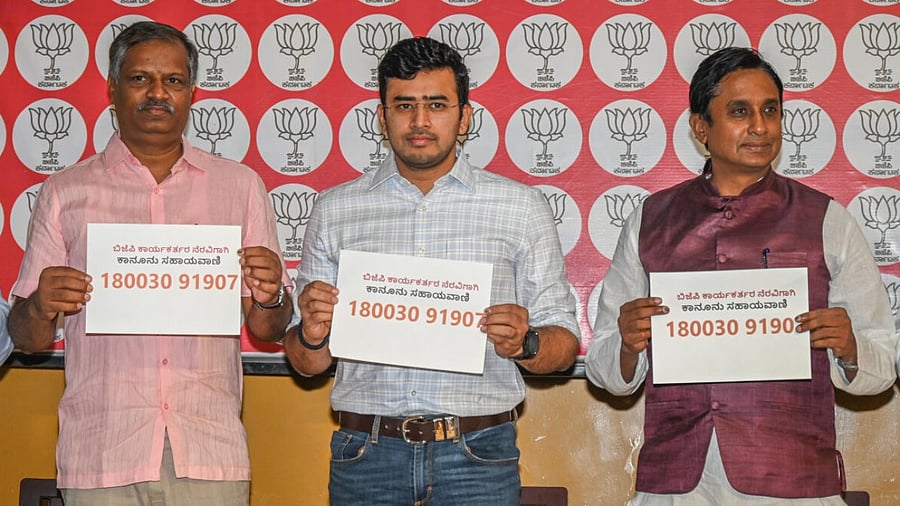 Bangalore South BJP MP Tejasvi Surya, along with BJP legal cell convenor Yogendra and Advocates Association president Vivek Subba Reddy, launches BJP legal aid helpline at party headquarters in Bengaluru on Saturday. DH Photo/ S K Dinesh