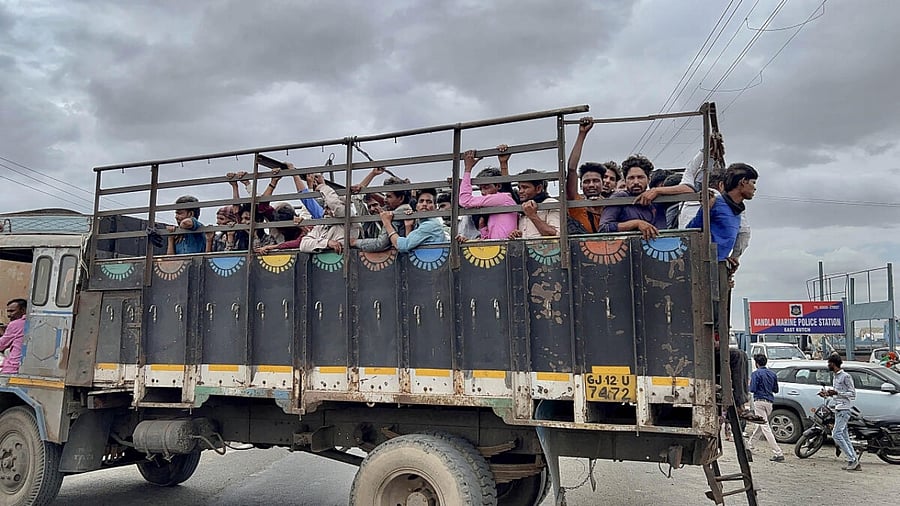 Villagers leave Jakhau village during evacuation ahead of cyclone Biparjoy’s landfall. Credit: PTI Photo