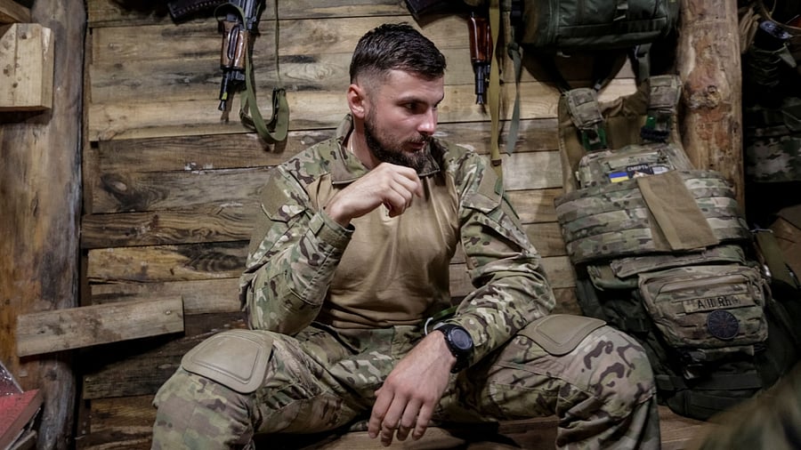 A Ukrainian serviceman is seen in a shelter. Credit: Reuters Photo