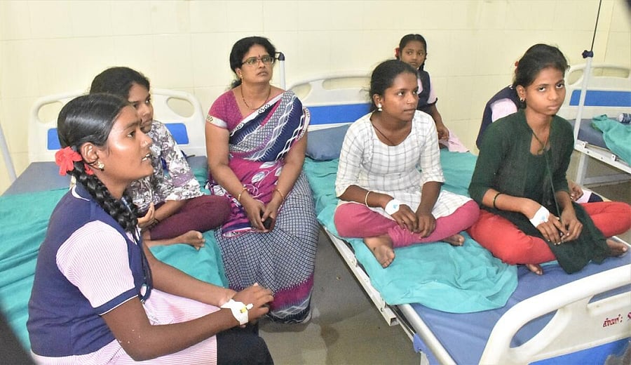 Girl students of Kittur Rani Chennamma Residential School, Kodla, receive treatment at Taluk Government Hospital in Sedam, Kalaburagi district.